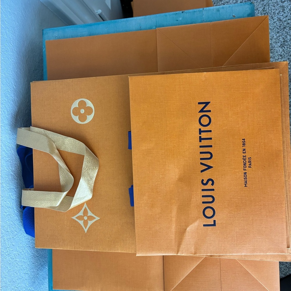 Louis Vuitton Orange Shopping Bags with Gold and Blue Accents